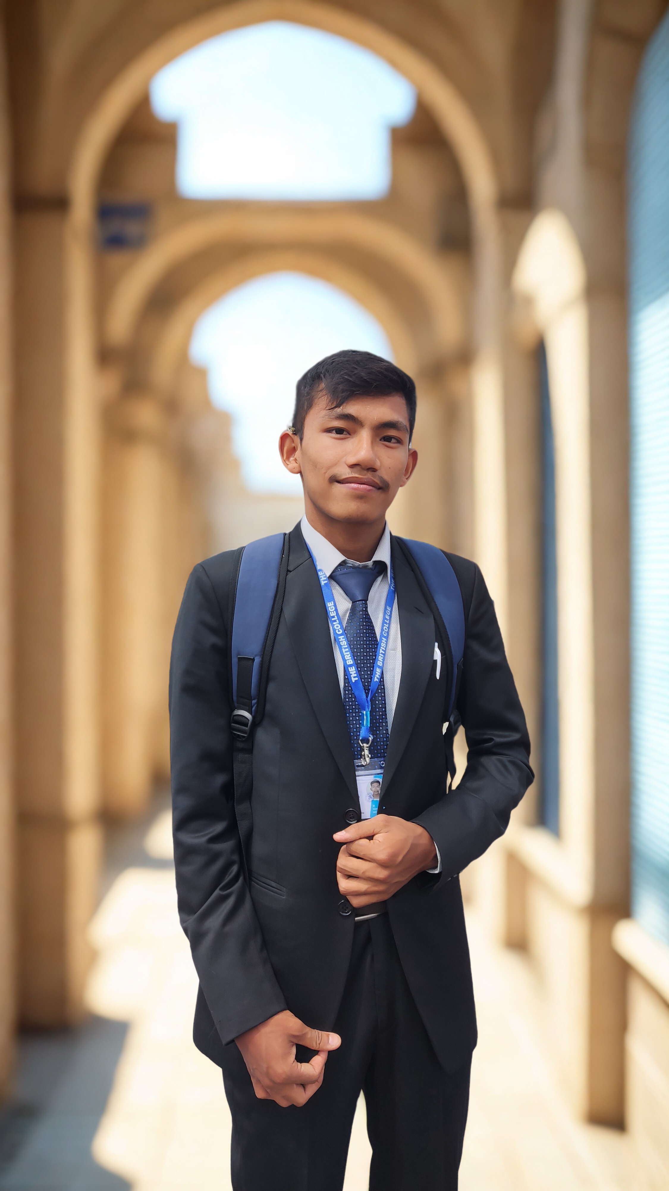 Digant Suwal in formal attire